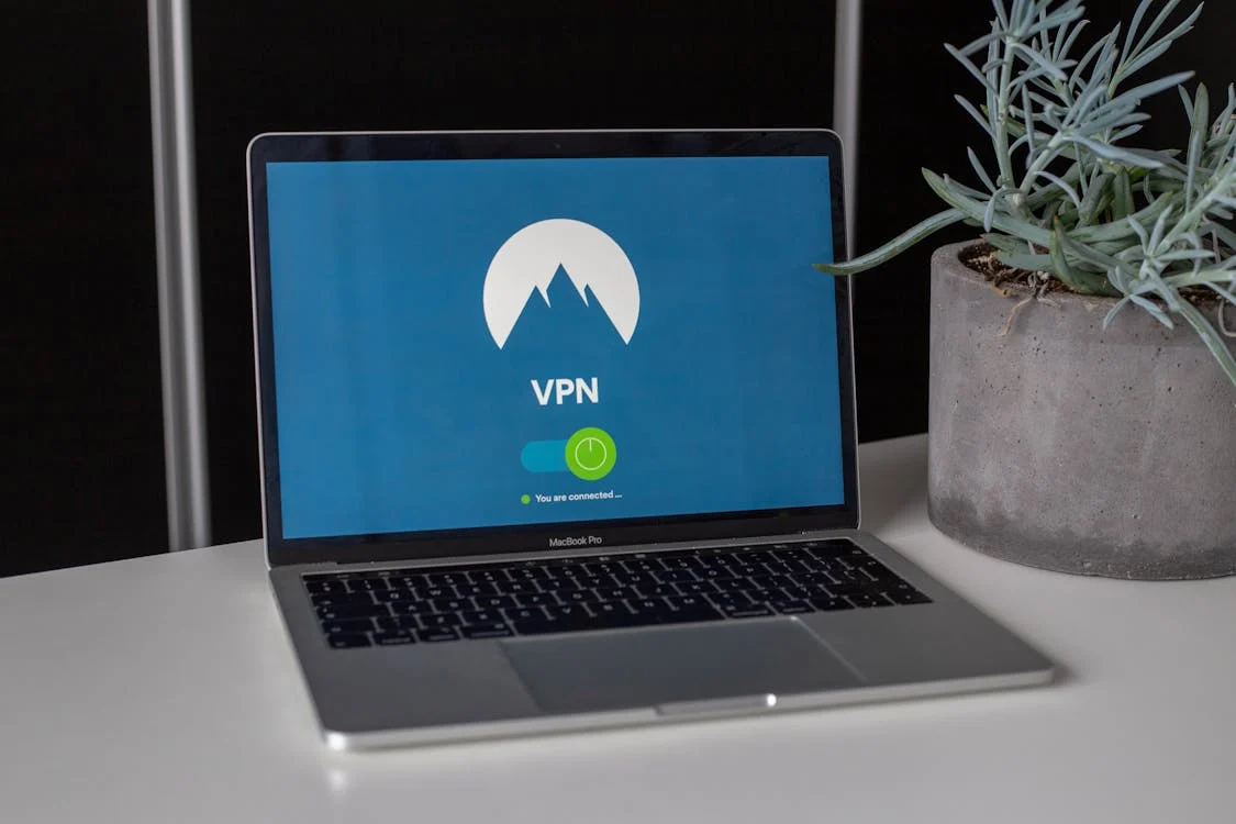 https://www.pexels.com/photo/grey-and-black-macbook-pro-showing-vpn-2064586/
