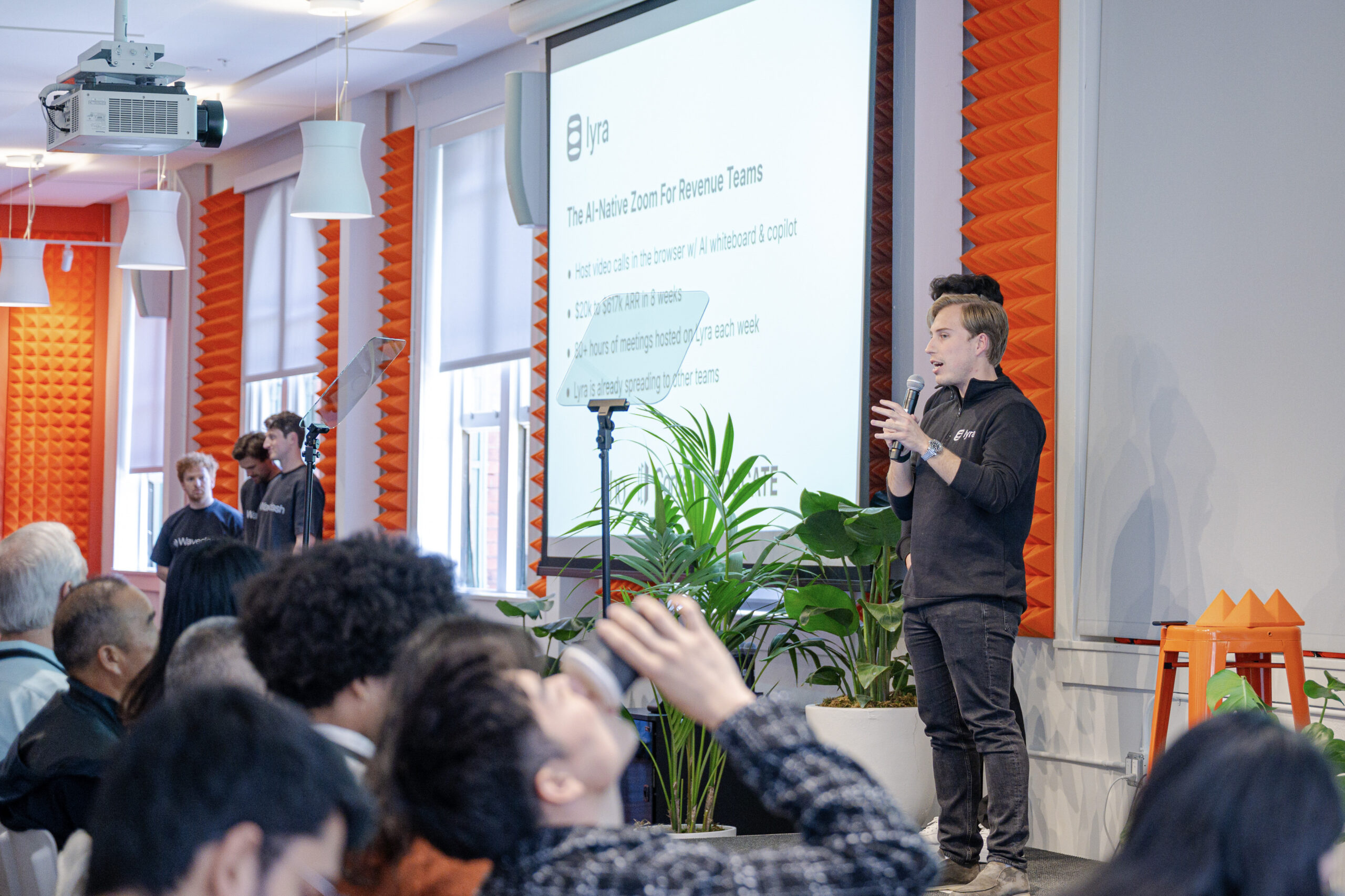 Marland and Kwon presenting at Y Combinator's X25 Demo Day